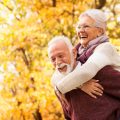 Portrait of healthy senior couple with toothy smile